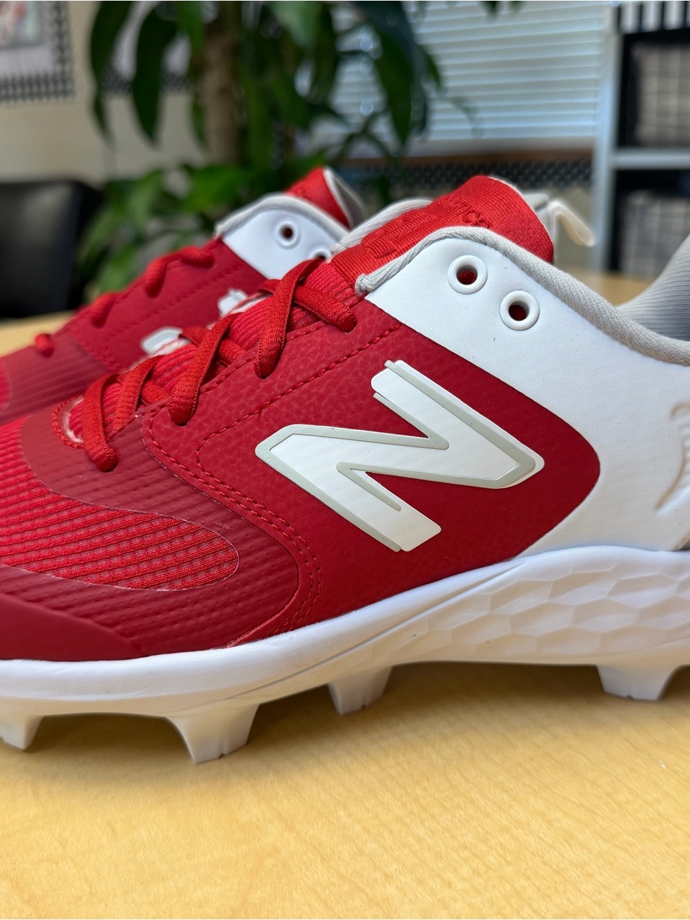 New Balance Women’s Red and White Fast Pitch Molded Cleats